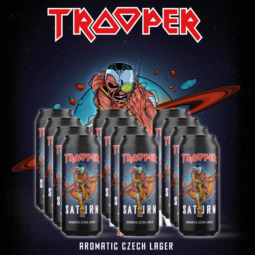 Trooper Saturn Aromatic Czech Lager – 12-pack of Iron Maiden beer cans in front of Eddie and Saturn background, official Czech lager release visual.