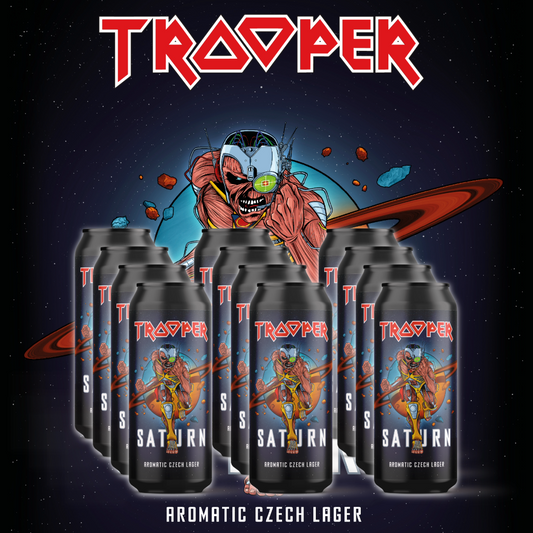 Trooper Saturn Aromatic Czech Lager – 12-pack of Iron Maiden beer cans in front of Eddie and Saturn background, official Czech lager release visual.